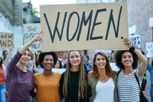 Multi-ethnic group of happy females on a demonstrations for women's rights.