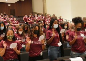 students taking professionalism pledge