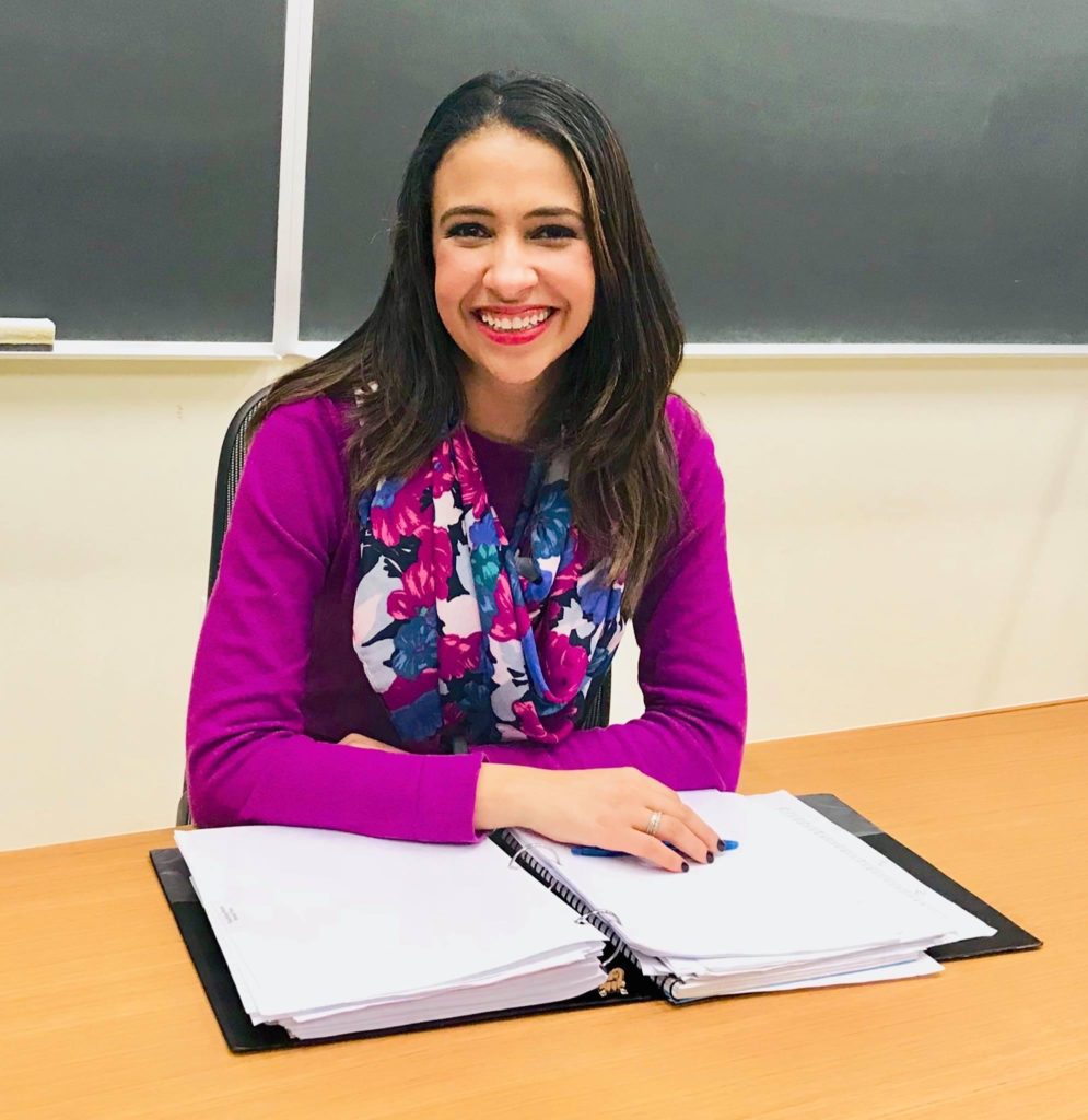 Erika Harold at desk 