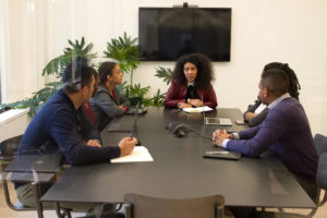diverse group of people around a conference table
