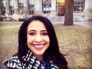 Erika Harold in front of the Harvard Law School Law Library