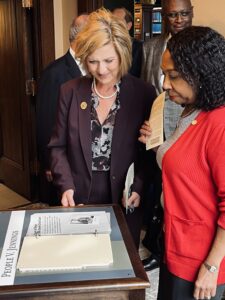 Illinois Supreme Court Justice Mary K. O'Brien and Justice Joy V. Cunningham at a Learning Center exhibit