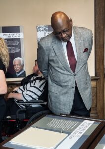 Illinois Supreme Court Justice P. Scott Neville at a Learning Center exhibit