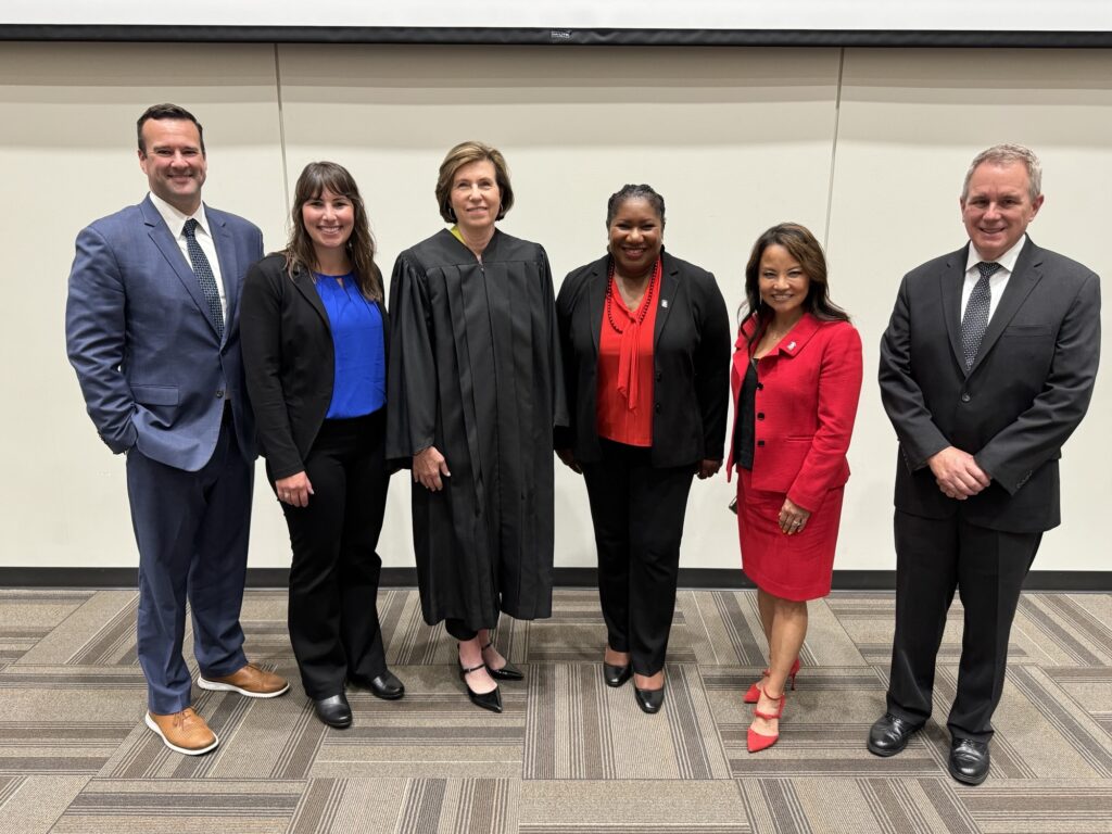 Chief Counsel Mark Palmer, Commissioner Amanda J. Hamilton, Illinois Supreme Court Liaison Justice Elizabeth Rochford, Dean Cassandra Hill, ISBA President Sonni Williams, and President of NIU Law Alumni Council Jay Wiegman at the Northern Illinois University College of Law professionalism orientation