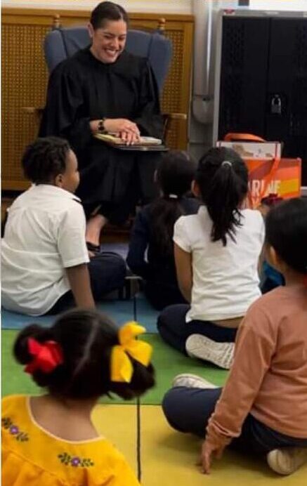 Judge Diana E. López speaking with students at the Illinois Judges Association Back to School Day