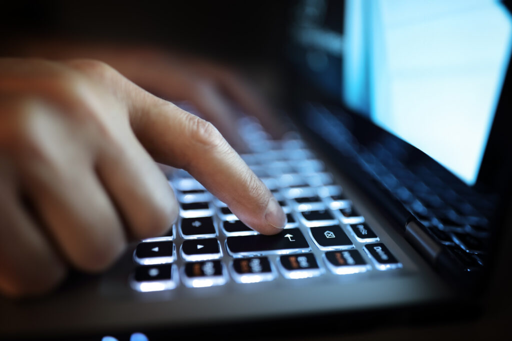 ai lawyers Late night internet addiction or working late man using laptop computer in the dark