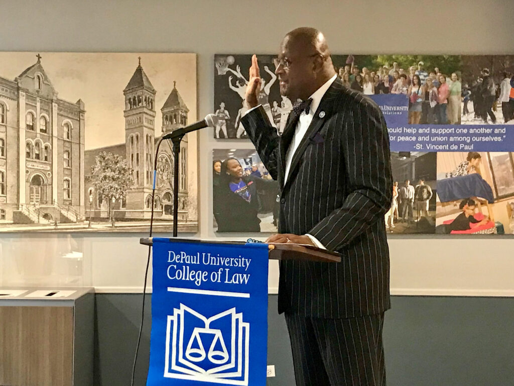 Chief Justice P. Scott Neville administering the Pledge of Professionalism at the 2023 DePaul University College of Law professionalism orientation